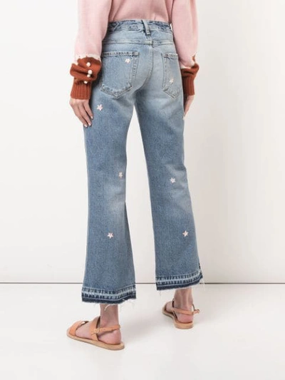 Shop Alanui Floral Embroidered Cropped Jeans In Blue