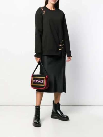 Shop Versace Medusa Detailed Knit Jumper In Black