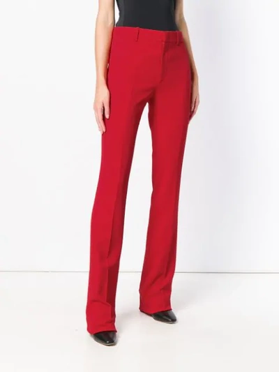 Shop Gucci Slim Fit Trousers In Red
