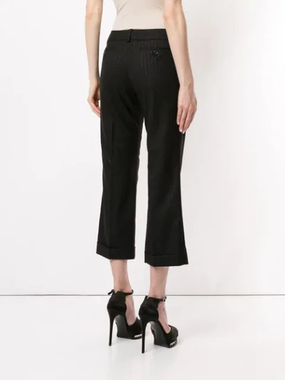 Shop Saint Laurent Cropped Pinstripe Trousers In Black