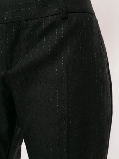 Shop Saint Laurent Cropped Pinstripe Trousers In Black