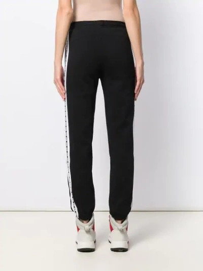Msgm Embroidered Cotton-blend Fleece Track Pants In Black