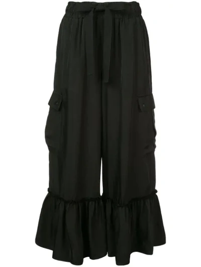 Shop Cinq À Sept Cropped Ruffle Hem Trousers In Black