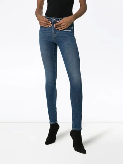 Shop Off-white Embroidered Logo Stretch Skinny Jeans In 8700 Blue