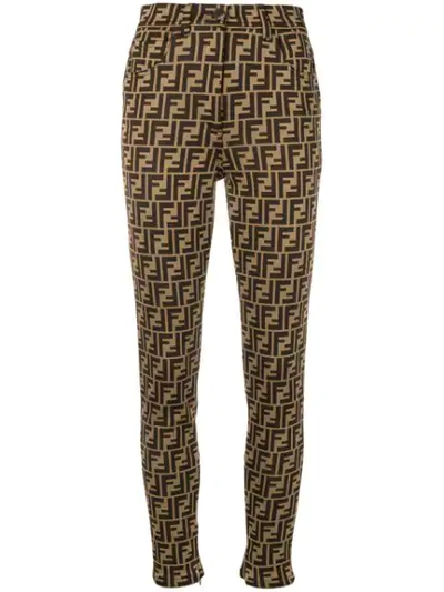 Shop Fendi Slim Fit Logo Trousers In Brown
