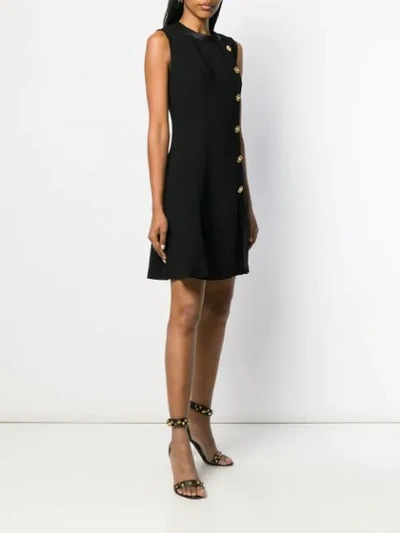 Shop Versace Side Button Short Dress In Black