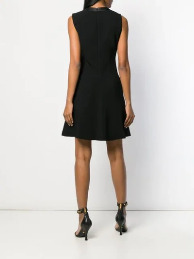 Shop Versace Side Button Short Dress In Black