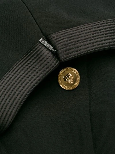 Shop Versace Side Button Short Dress In Black