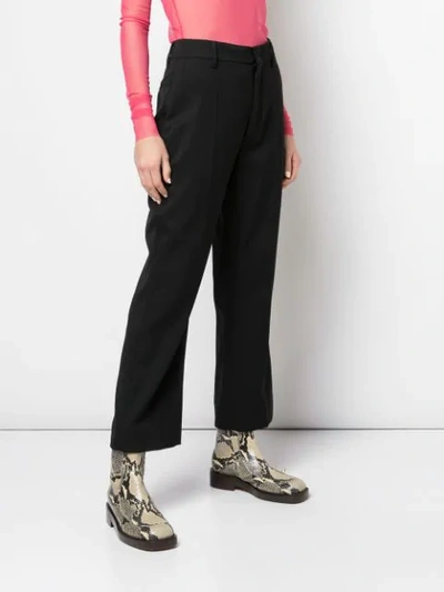 Shop Prada Cropped Flared Trousers In Black