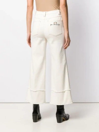 Shop Miu Miu Mid Rise Flared Trousers - White