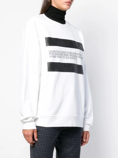Shop Calvin Klein Jeans Est.1978 Designer Bio Print Sweatshirt In White