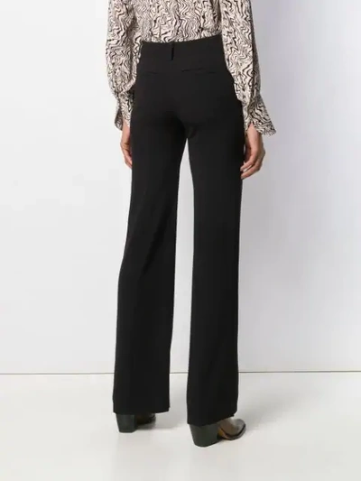 Shop Chloé Raised Seam Flared Trousers In Black