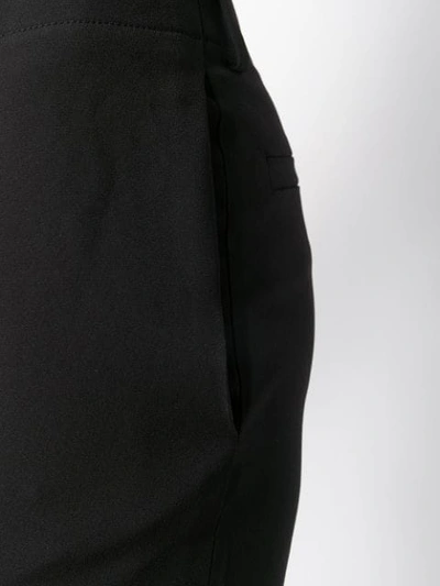 Shop Chloé Raised Seam Flared Trousers In Black