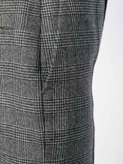 Shop Balenciaga Check Print Wool Trousers - Black