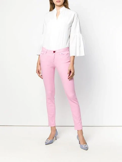 Shop Dolce & Gabbana Rose Button Skinny Jeans In Pink