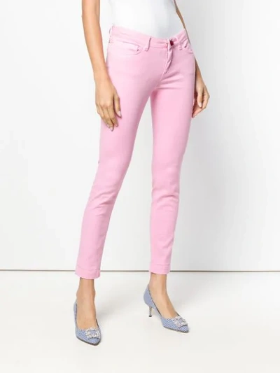 Shop Dolce & Gabbana Rose Button Skinny Jeans In Pink