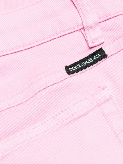 Shop Dolce & Gabbana Rose Button Skinny Jeans In Pink