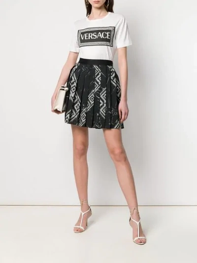 Shop Versace Collection Crystal Print Pleated Mini Skirt - Black