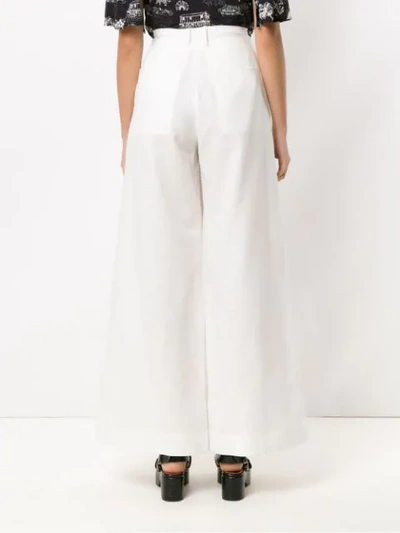 Shop Alcaçuz Flores Wide Leg Trousers In White