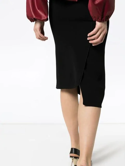 Shop Poiret Asymmetric Hem Midi Pencil Skirt In Black