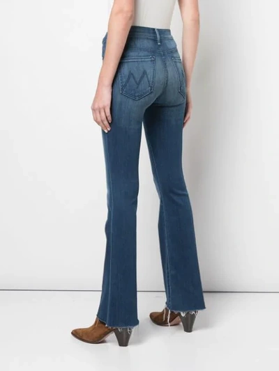 Shop Mother Flared High Rise Jeans In Blue