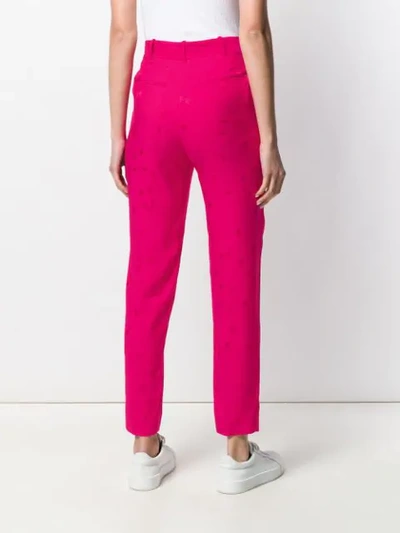 Shop Equipment Tapered Star Print Trousers In Pink