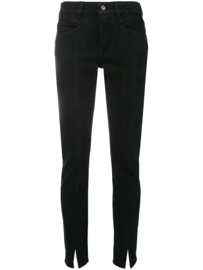 Shop Givenchy Front Slit Trousers In Black