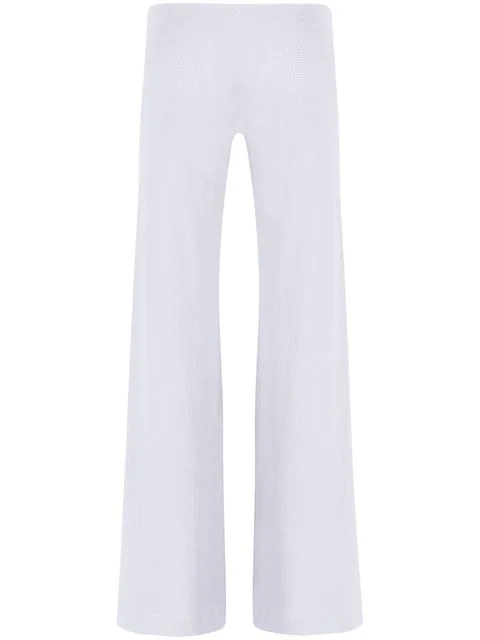 white ribbed flared trousers