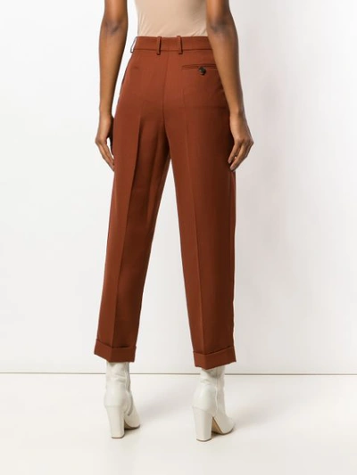 Shop Victoria Beckham High Waisted Pleat Trousers - Brown