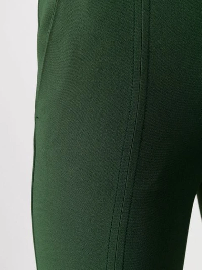 Shop Victoria Victoria Beckham Tailored Front Slit Trousers In Green