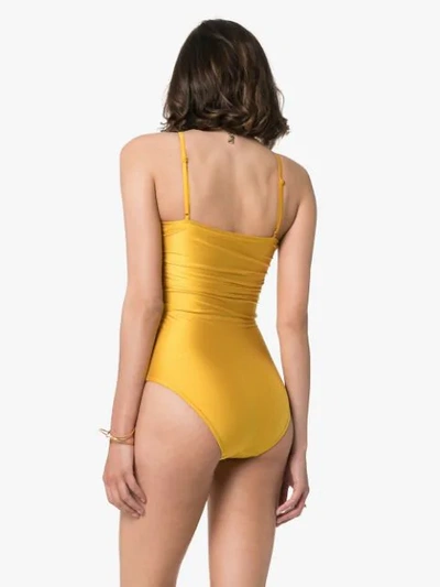 Shop Zimmermann Allia Ruched Halterneck Swimsuit In Yellow