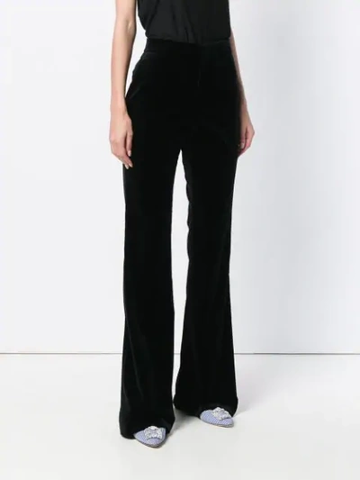Shop Gucci High-waisted Flared Trousers In Black