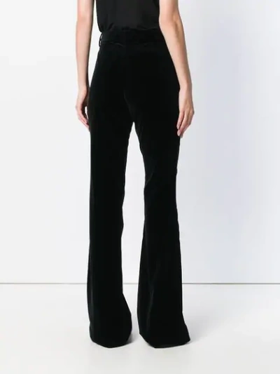 Shop Gucci High-waisted Flared Trousers In Black