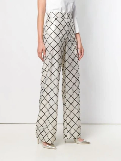 Shop Genny Geometric Printed Trousers In Neutrals