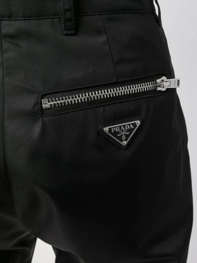 Shop Prada Zipped Cropped Trousers In Black