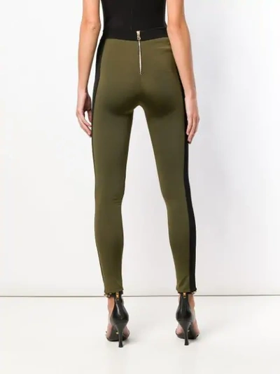 Shop Balmain Side Stripe Leggings In Green