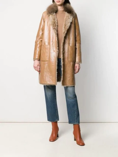 Shop Manzoni 24 Shearling Lined Coat In Brown