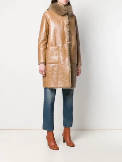 Shop Manzoni 24 Shearling Lined Coat In Brown