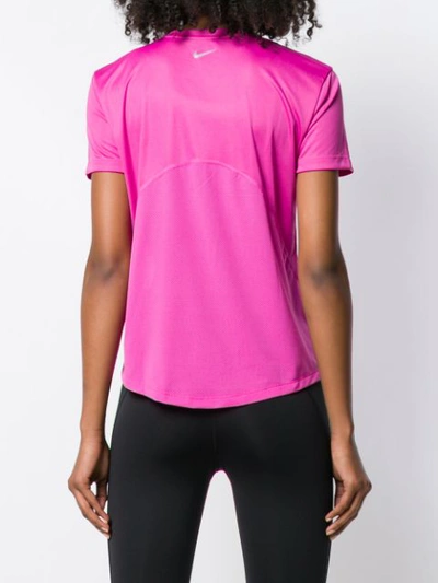 Shop Nike Miller T-shirt - Pink
