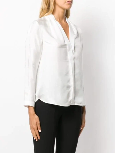 Shop Sandro Long-sleeved V-neck Blouse In White