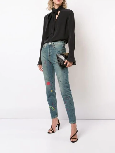 Shop Saint Laurent Embroidered High-rise Jeans In Blue