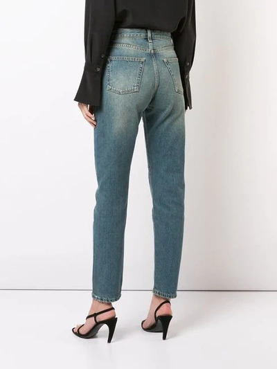Shop Saint Laurent Embroidered High-rise Jeans In Blue