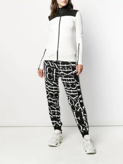 Shop Michael Kors Logo Print Track Pants In 048 Black/white