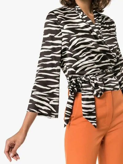 Shop Ganni Blakely Zebra Print Silk Wrap Top In Black