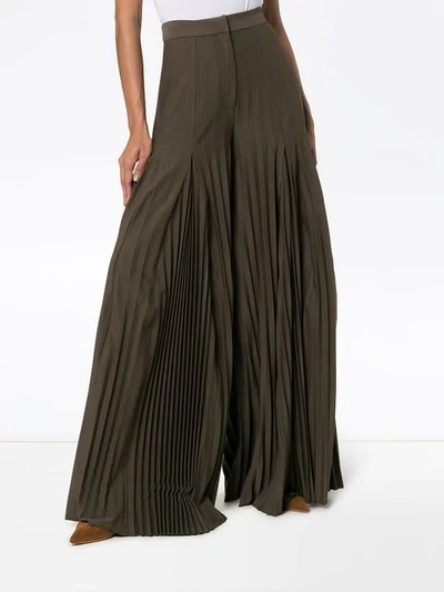 Shop Jacquemus High Waisted Pleated Trousers In Green