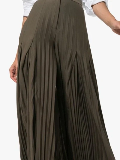 Shop Jacquemus High Waisted Pleated Trousers In Green