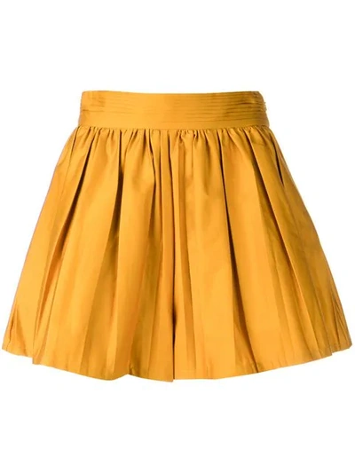 Shop Amur Pleated Wide Shorts In Yellow
