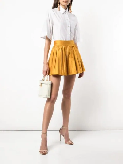 Shop Amur Pleated Wide Shorts In Yellow