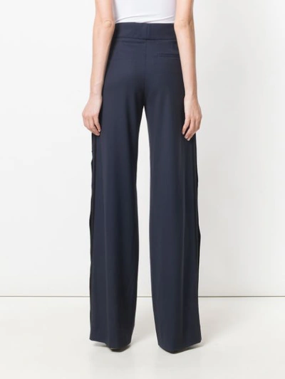 Shop Monse Side Pinned Flared Trousers In Blue