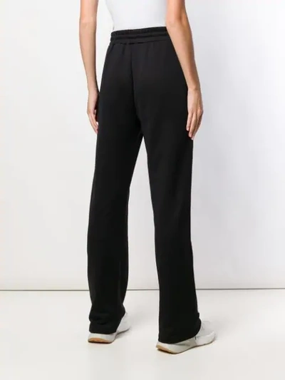 Shop Red Valentino Forget Me Not Printed Track Pants In Black